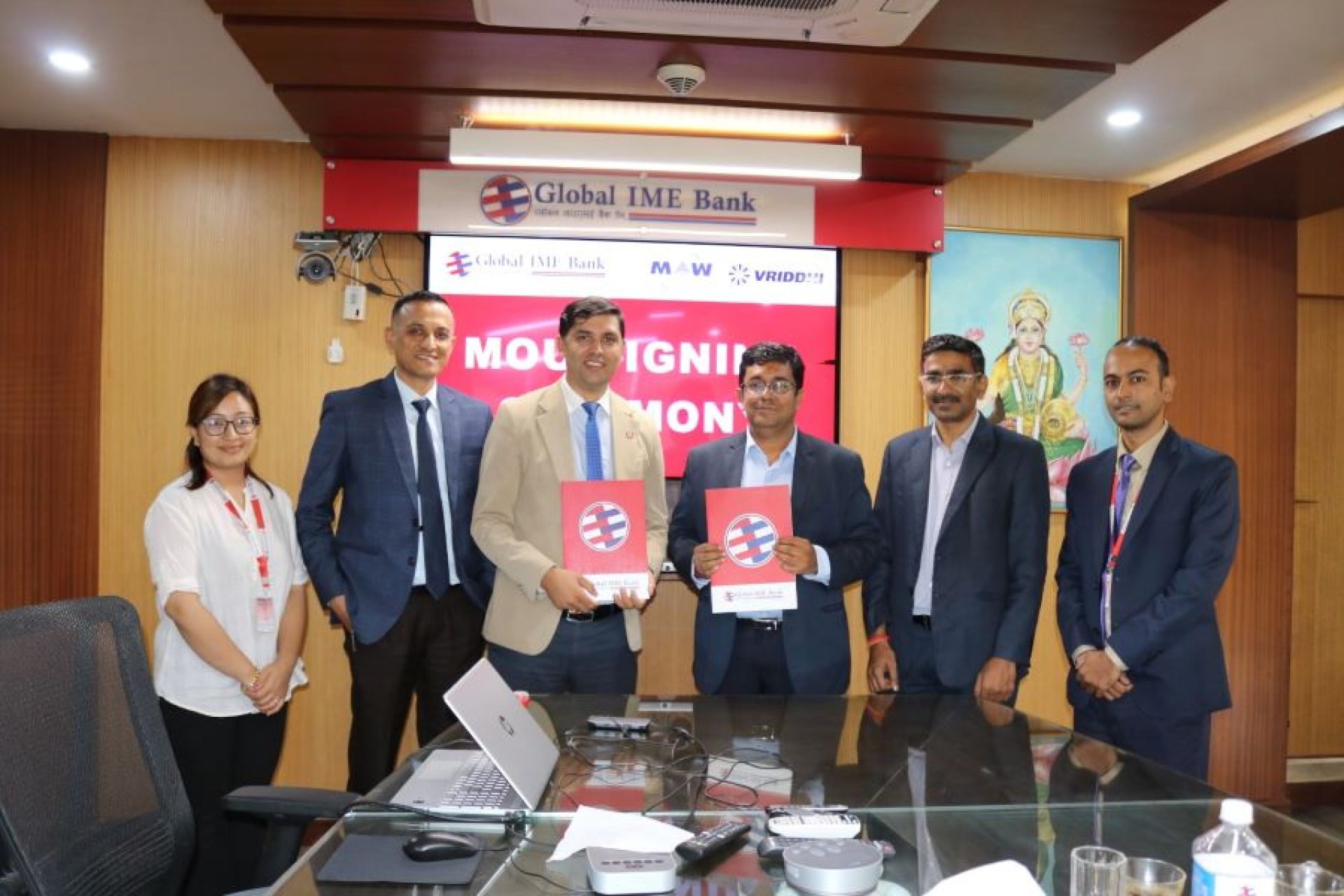 ग्लोबल आइएमई बैंक र एमएडब्लु बीच विद्युतीय सवारी कर्जा प्रवाह सम्बन्धी सम्झौता